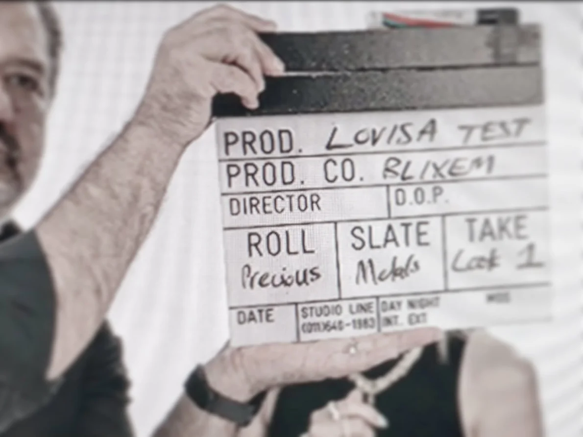 Camera viewfinder recording a two-person interview for a broadcast commercial shoot